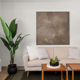 a living room with a couch and a coffee table