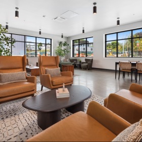 resident lounge area with chairs and coffee table